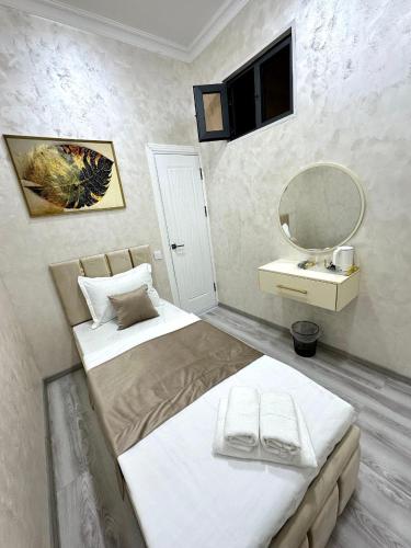 Katil atau katil-katil dalam bilik di Astoria Inn