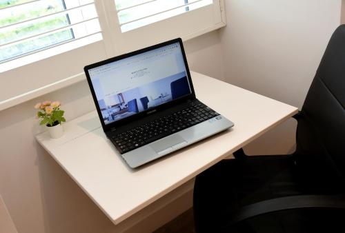 Apple Tree Place B&Bにあるテレビまたはエンターテインメントセンター