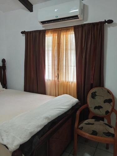 Postel nebo postele na pokoji v ubytování Casa Tranquilidad