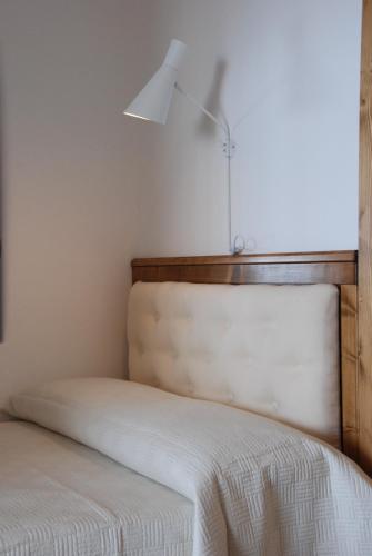 Letto o letti in una camera di Santo Mercurio Country House