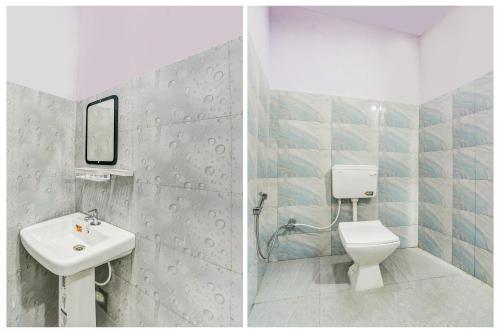 a bathroom with a white toilet and a sink at Hotel O Yamuna Residency in Jamshedpur