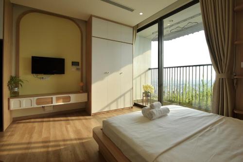 Katil atau katil-katil dalam bilik di Thư Room View sông Hồng