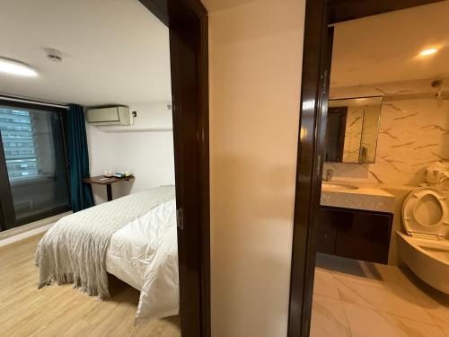 Spark Hotel & Serviced Apartmentsにあるベッド