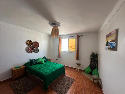 Postel nebo postele na pokoji v ubytování F4 apartment