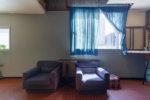 Posezení v ubytování noctarium - A Private Cinema Hotel