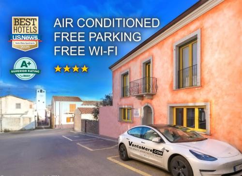 an image of a car parked in front of a building at Apartments & Suites Vento Mare in Palau