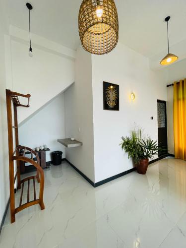 Zona de estar de Kumudu Holiday Home