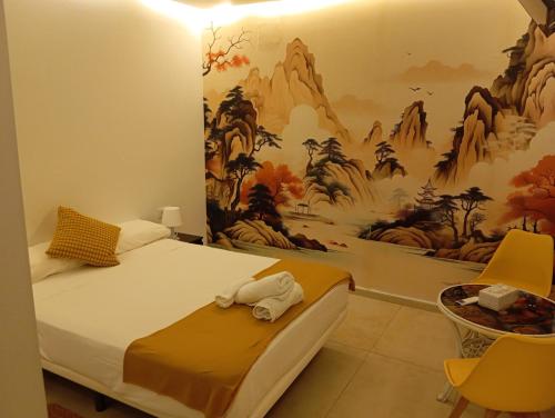 Giường trong phòng chung tại El Refugio del Estrecho