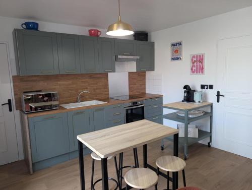 Køkken eller tekøkken på Maison avec jardin Reims proche centre