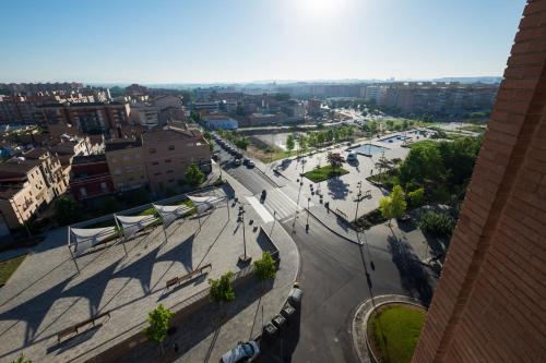 an overhead view of a city with a street at Hotel Nadal in Lleida
