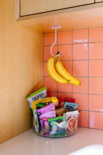 a bunch of food and a banana on a hook at Stargaze Escape By The Cohost Company in Yucca Valley
