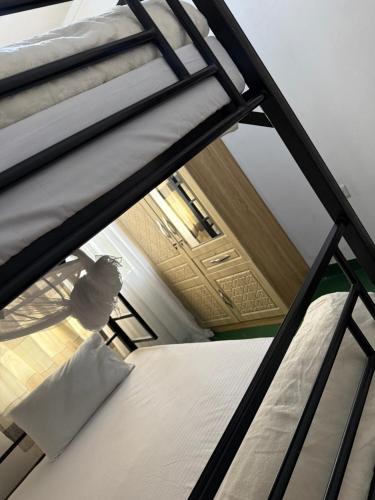 Postel nebo postele na pokoji v ubytování chilala apartments