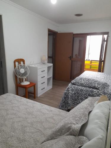 Llit o llits en una habitació de Casa Amarela