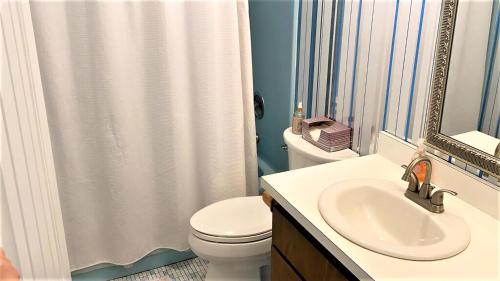 Ένα μπάνιο στο Alexander Point Paradise