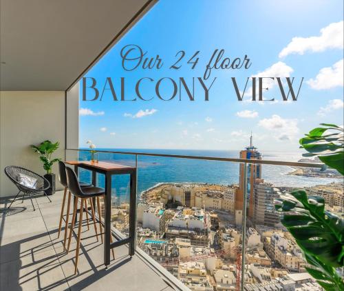 a balcony with a view of the ocean at 24th Floor Luxury Sea View Apart-Hotel Pools Spa Gym & Rooftop I Mercury Tower in St. Julianʼs