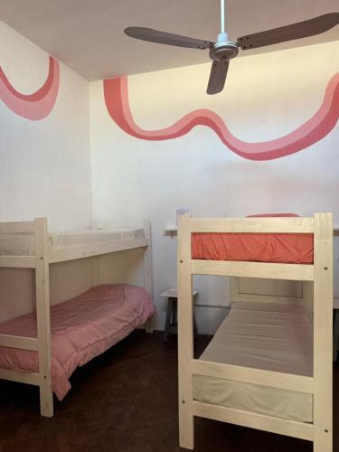 Una cama o camas en una habitación de 3260HOSTEL