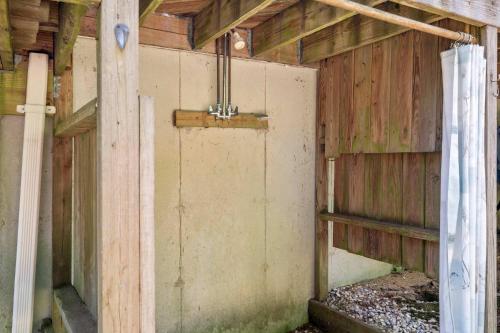 an inside view of a barn with a door at Bring your pups to Chatham Direct access to the Cape Cod Rail Trail in Chatham