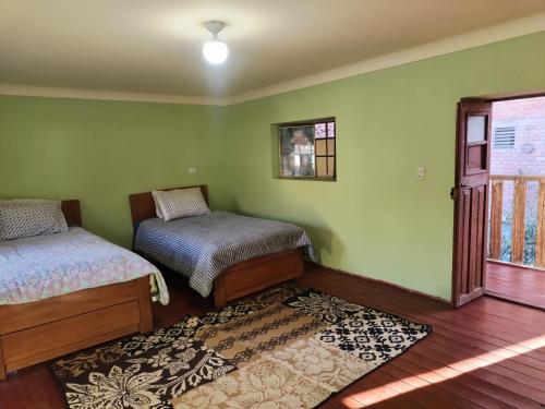 Katil atau katil-katil dalam bilik di Casita en Urubamba