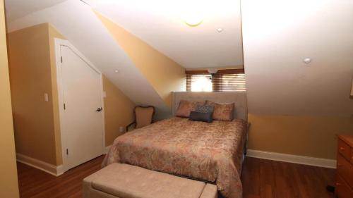 a small bedroom with a bed and a window at 1136 And 1138 Lafayette Street Condo in Cape May