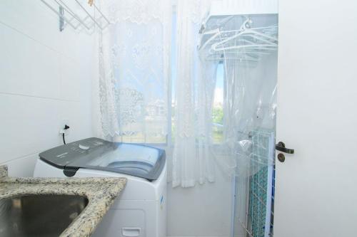 Un baño de Apto com piscina e churrasqueira VS6418