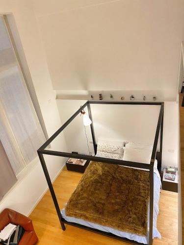 Design loft in the Navigli-Forum area with private parking