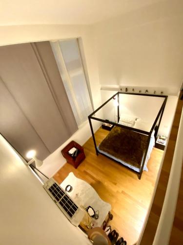 Design loft in the Navigli-Forum area with private parking