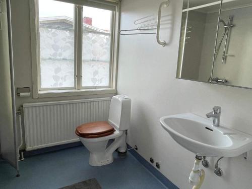 a bathroom with a toilet and a sink at 10 person holiday home in Mörbylånga-By Traum in Mörbylånga