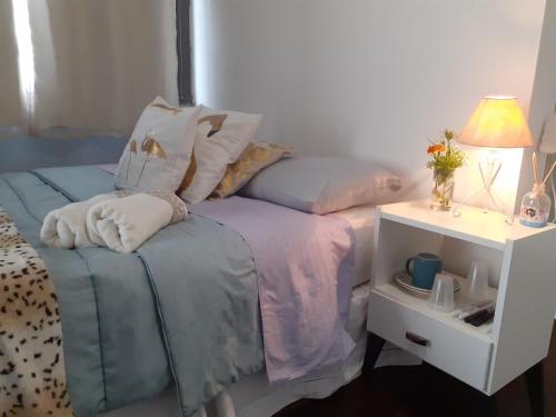 Postel nebo postele na pokoji v ubytování Pousada Villa Dom Carlos