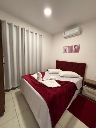 Katil atau katil-katil dalam bilik di Casa com piscina Balneário Camboriú CasaAlbertiBc
