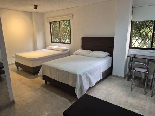 Postel nebo postele na pokoji v ubytování Apartmento 203, Zona Sur, Templete, Cali