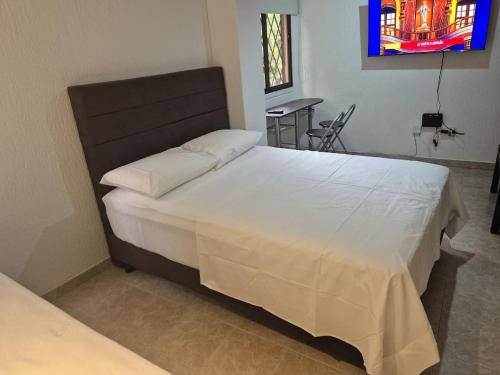 Postel nebo postele na pokoji v ubytování Apartmento 203, Zona Sur, Templete, Cali