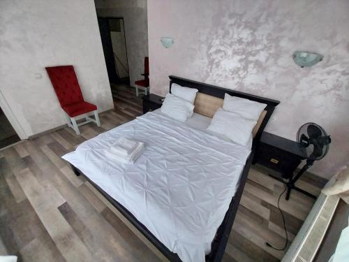 Ένα ή περισσότερα κρεβάτια σε δωμάτιο στο LCB Suites Elena Doamna Iaşi