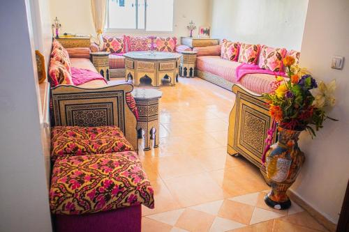 Giường trong phòng chung tại Appartement Damas au centre de Kénitra