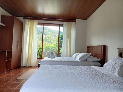 Cama o camas de una habitación en La Quinta de Andrés