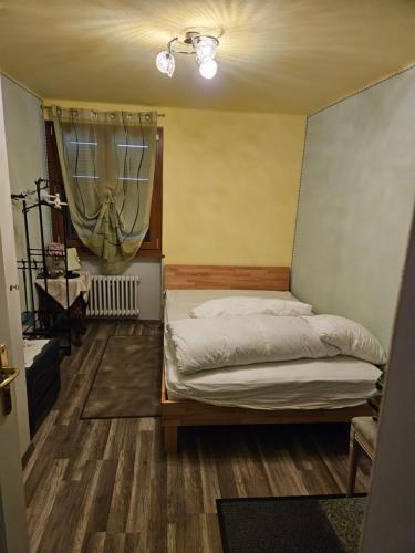Katil atau katil-katil dalam bilik di 1 petite chambre dans une maison privé