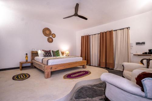 Ένα ή περισσότερα κρεβάτια σε δωμάτιο στο Di Milo Boutique Hotel