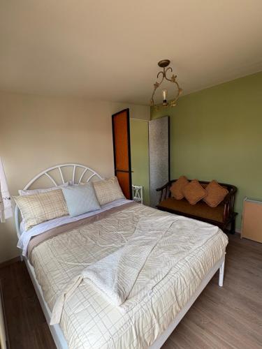 Una cama o camas en una habitación de Hostal Chakiñan
