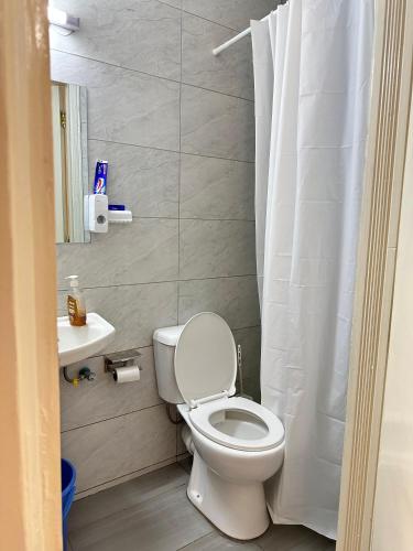 Koupelna v ubytování Qara Homes