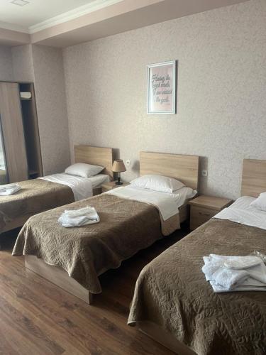 Postel nebo postele na pokoji v ubytování Apart Hotel Four Rooms