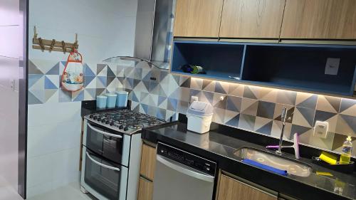 Foto Guaraparis asuva majutusasutuse Alto Padrão, Vista Mar, Varanda Gourmet, Nascente Compartilhar SalvarHigh Standard, Sea View, Gourmet Balcony, East-facing galeriist