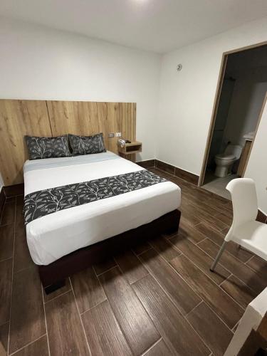 Postel nebo postele na pokoji v ubytování Aw Hotel Ariston Embassy