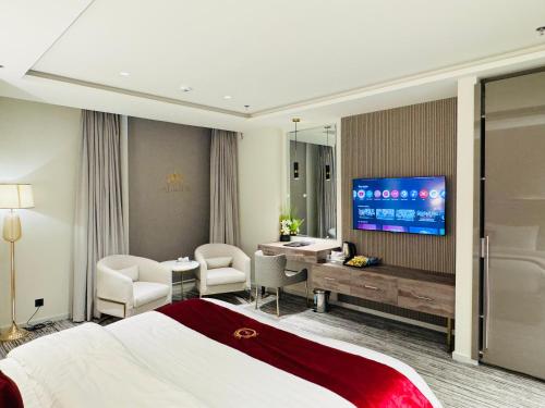 Μια τηλεόραση ή/και κέντρο ψυχαγωγίας στο TAJ Executive Hotel With Premium Services