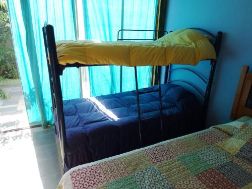Cama o camas de una habitación en CABAÑAS SAKAR