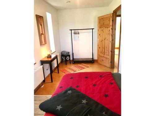Katil atau katil-katil dalam bilik di Hygge Hus am See