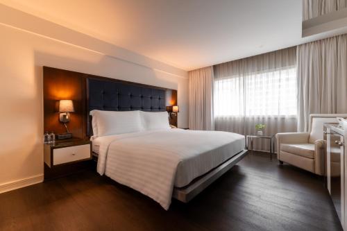 Letto o letti in una camera di Night Hotel Bangkok - Sukhumvit 15