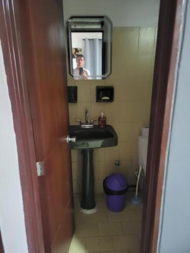 Un baño de Apartahotel Real