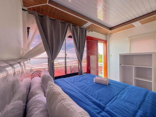 Postel nebo postele na pokoji v ubytování Raffiel Nias