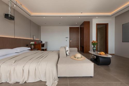 Postel nebo postele na pokoji v ubytování 铂诩海景客栈 BOXU Seaview Resort Villa