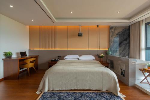 Postel nebo postele na pokoji v ubytování 铂诩海景客栈 BOXU Seaview Resort Villa