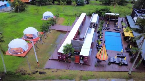 an aerial view of a house with a gazebo and a pool at Yellow House in Hengchun